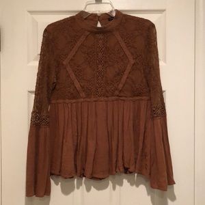 Bell sleeved embroidered top